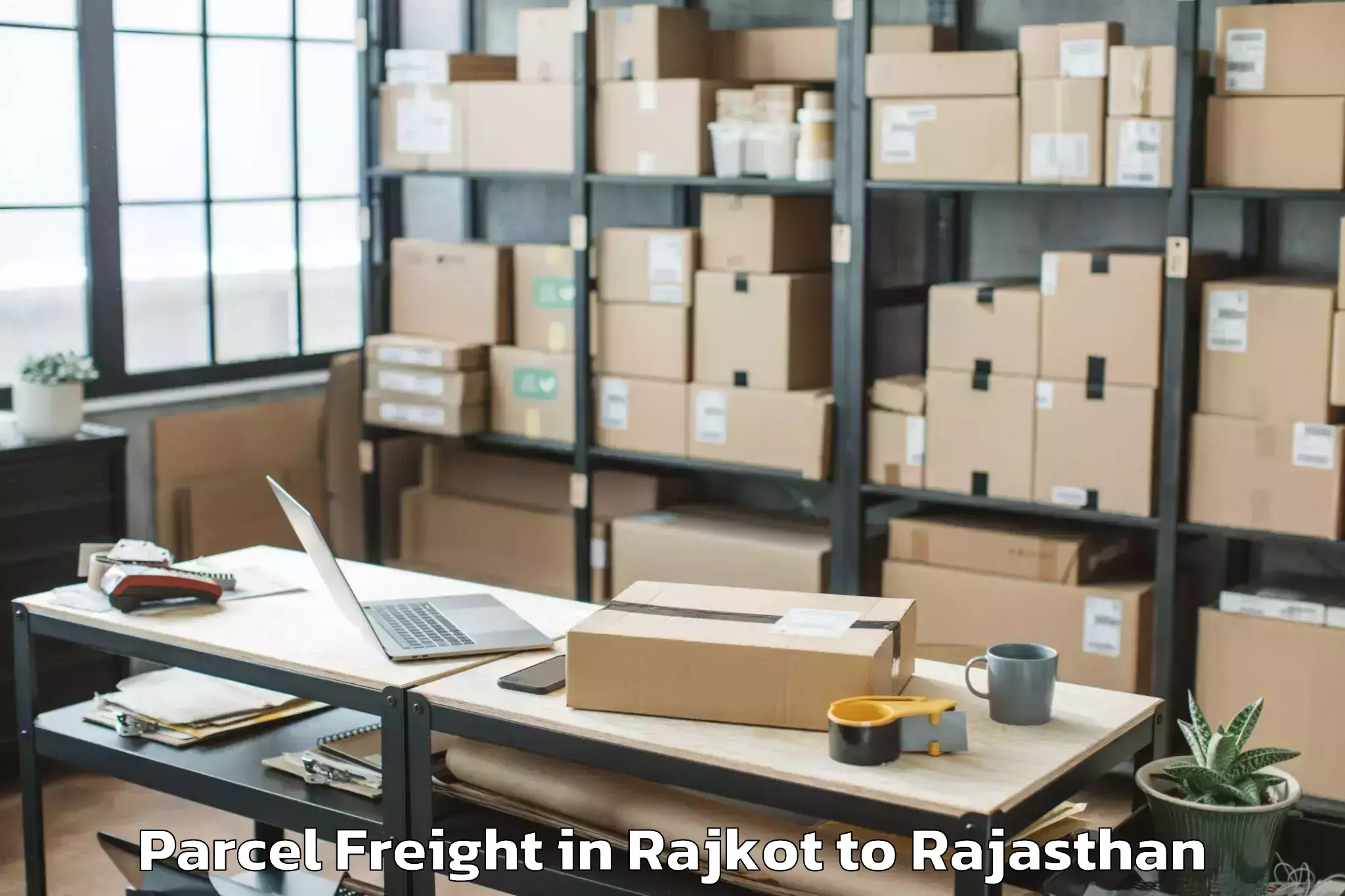 Professional Rajkot to Madhav University Pindwara Parcel Freight